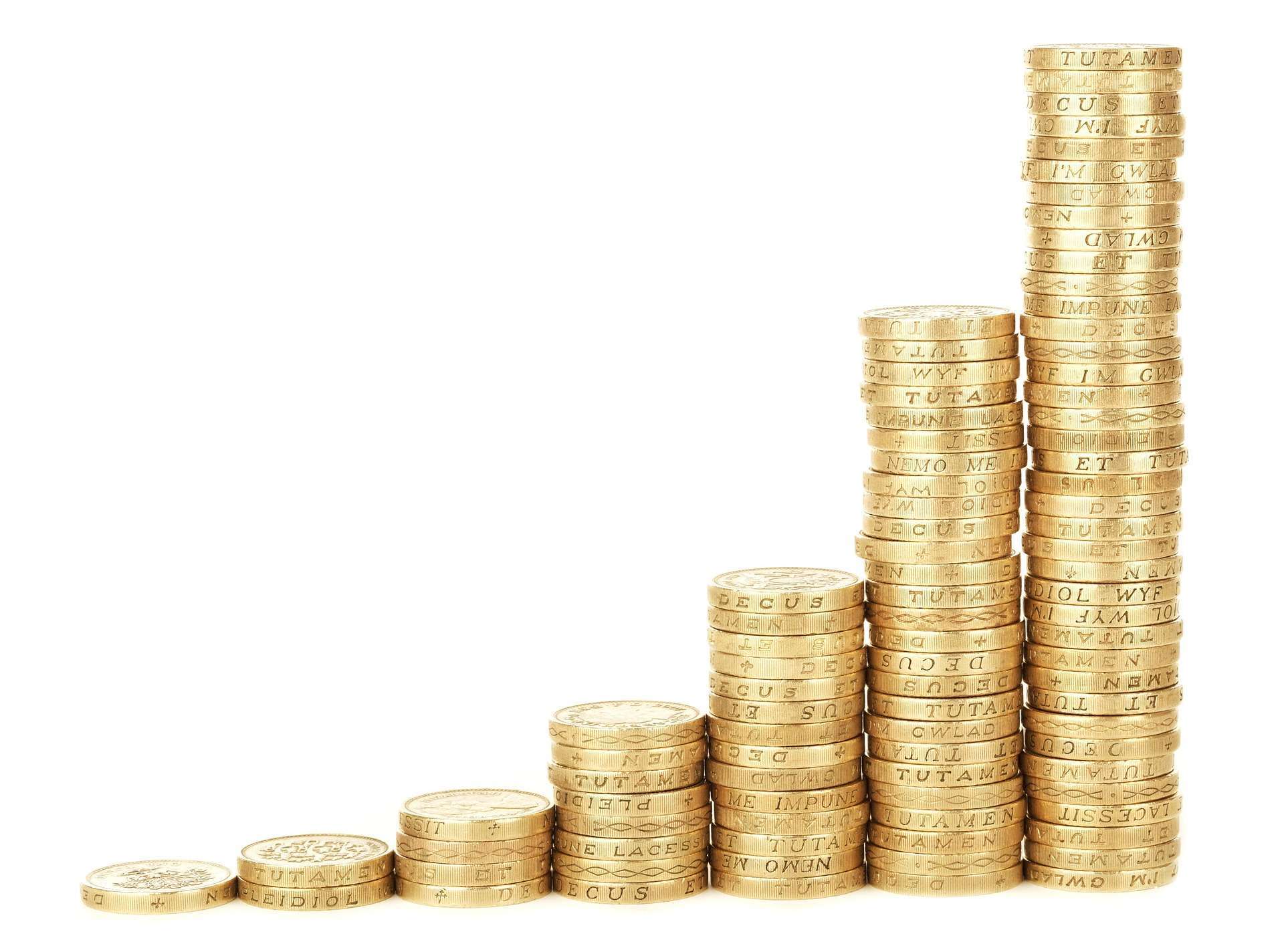 7 stacks of gold coins stacked smallest on the left to largest on right (1, 2, 4, 8, 16, 32, 64) on a plain white background